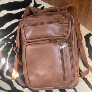 Brown vegan leather convertible backpack messenger bag with multiple pockets